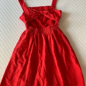 Adorable red dress with open back